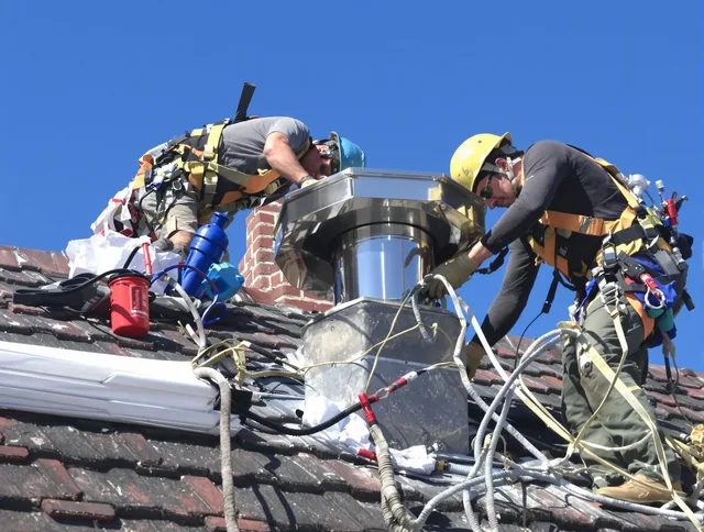 Protective chimney cap installed by Branford Chimney Sweep in Branford, CT